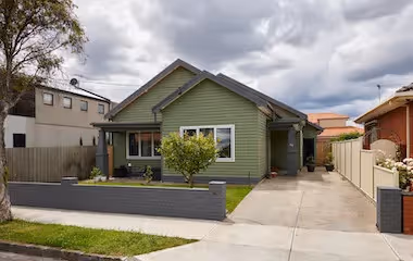 Front of a green cladded house