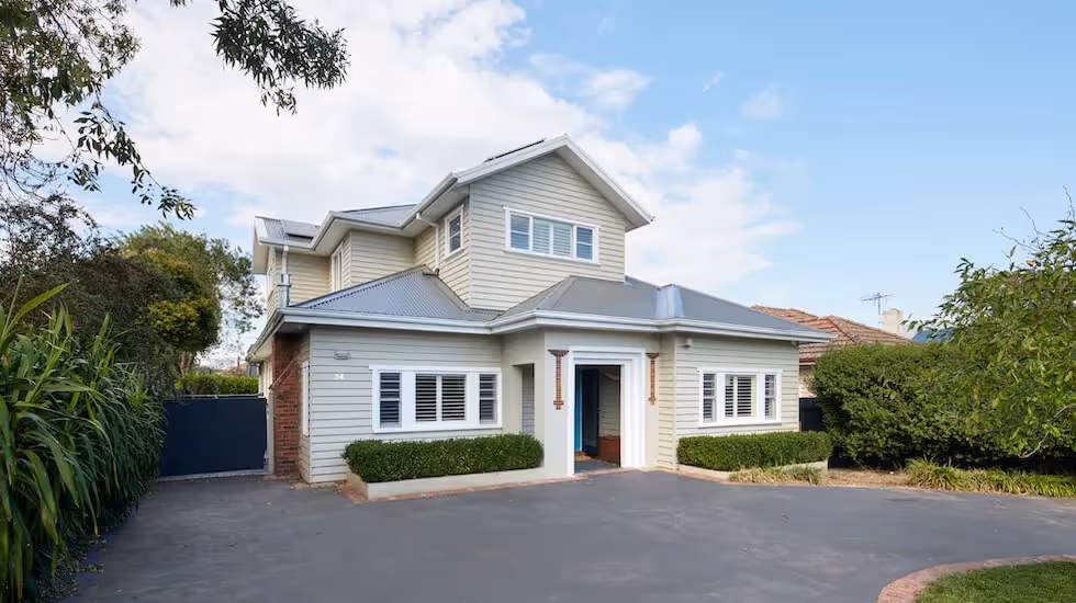 Outside of a home with a new second storey extension