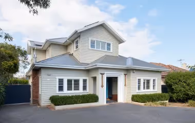 Outside of a home with a new second storey extension