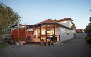 Home extension with timber deck and pergola.