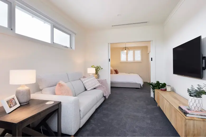 Modern living space in a home extension with neutral tones.