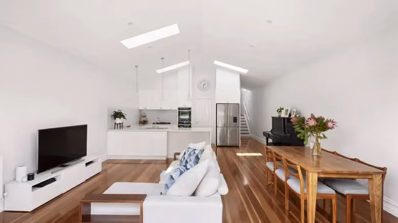 Bright open-plan renovation interior as part of a Melbourne home extension project.