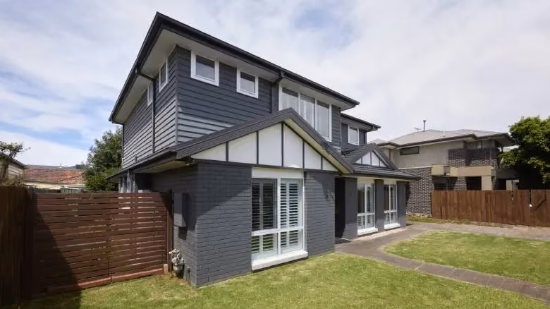 Contemporary Melbourne home renovation with second-storey addition and updated exterior.