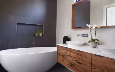 Three modern bathroom designs showing minimalist, small-space, and affordable luxury renovation ideas.