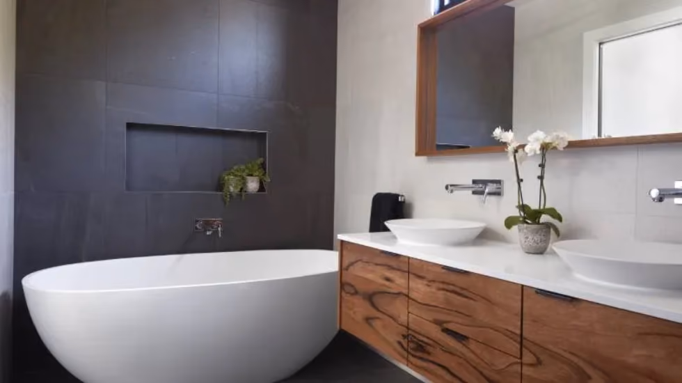 Three modern bathroom designs showing minimalist, small-space, and affordable luxury renovation ideas.