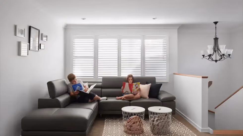 Children relaxing in a finished second-storey living area created through a modern home extension by Supa Group.