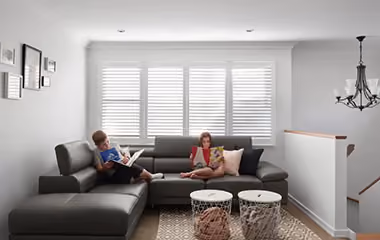 Children relaxing in a finished second-storey living area created through a modern home extension by Supa Group.