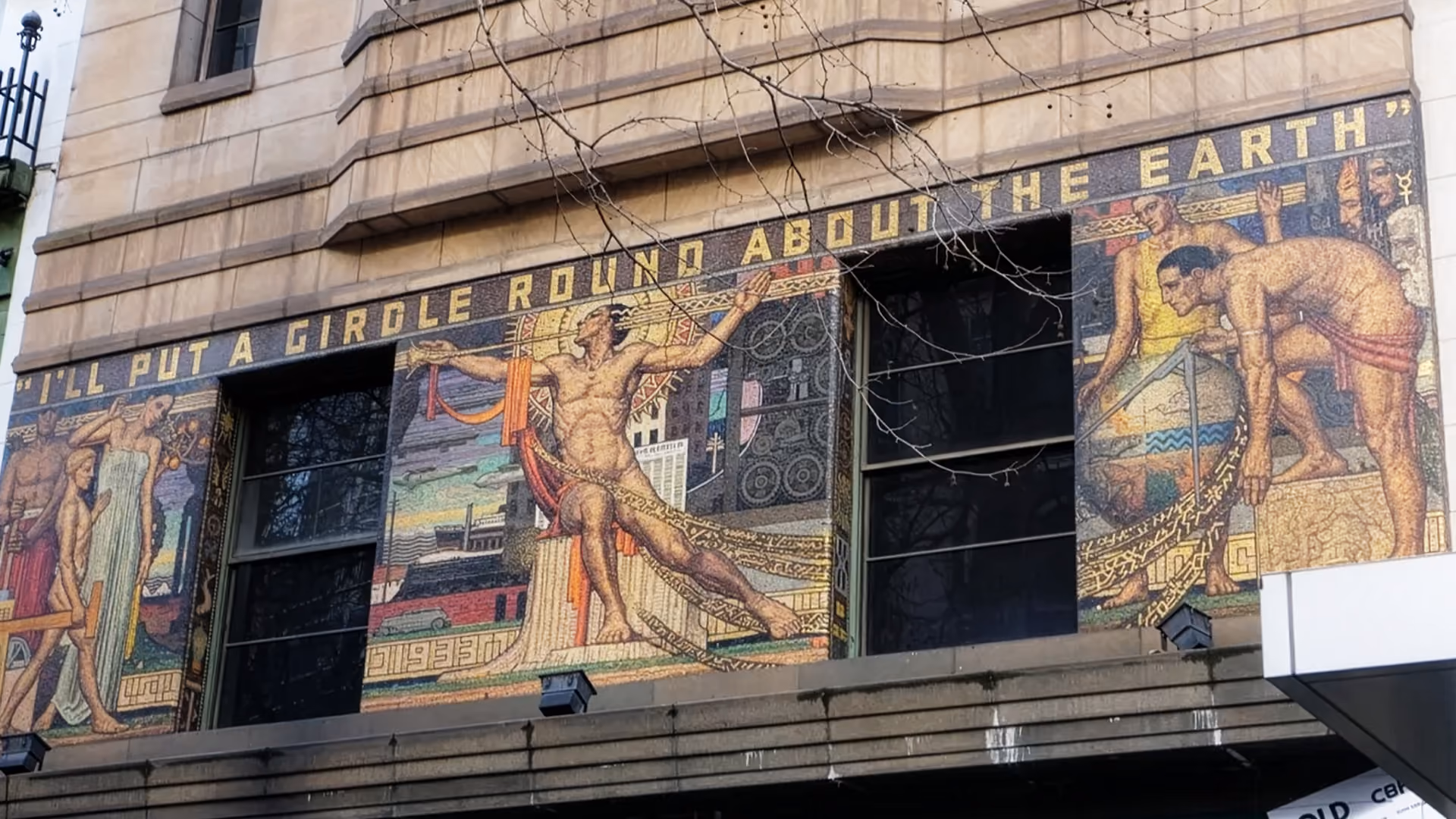 Mural artwork on the exterior of a historic Melbourne building created by Napier Waller.