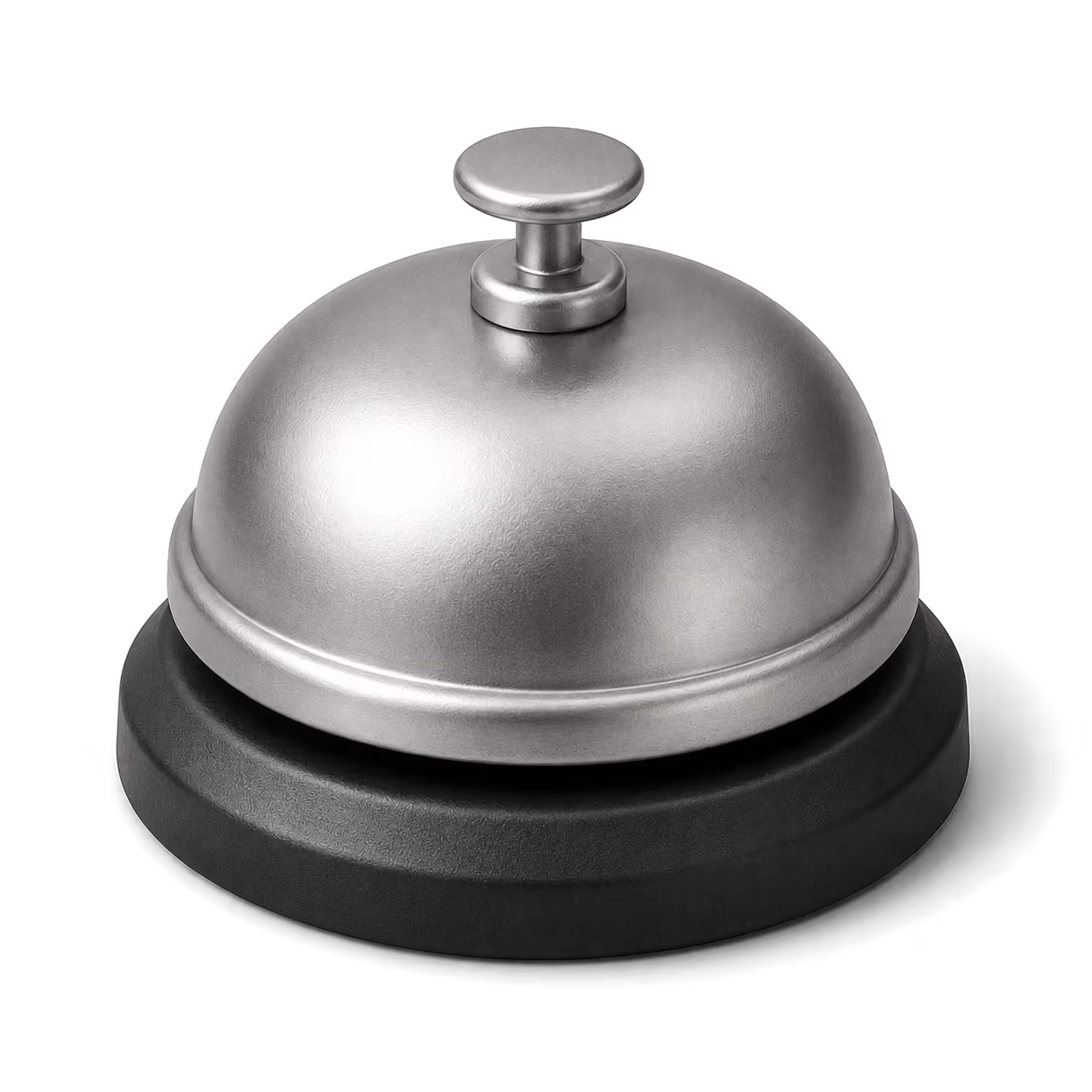 En klassisk bordsringklocka med en metallisk silverfärgad knapp ovanpå en svart bas.