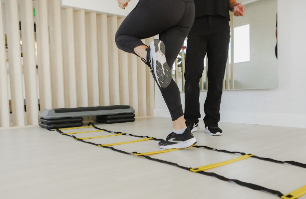 Patient working with a provider at a sports physical therapy clinic in Los Angeles, CA