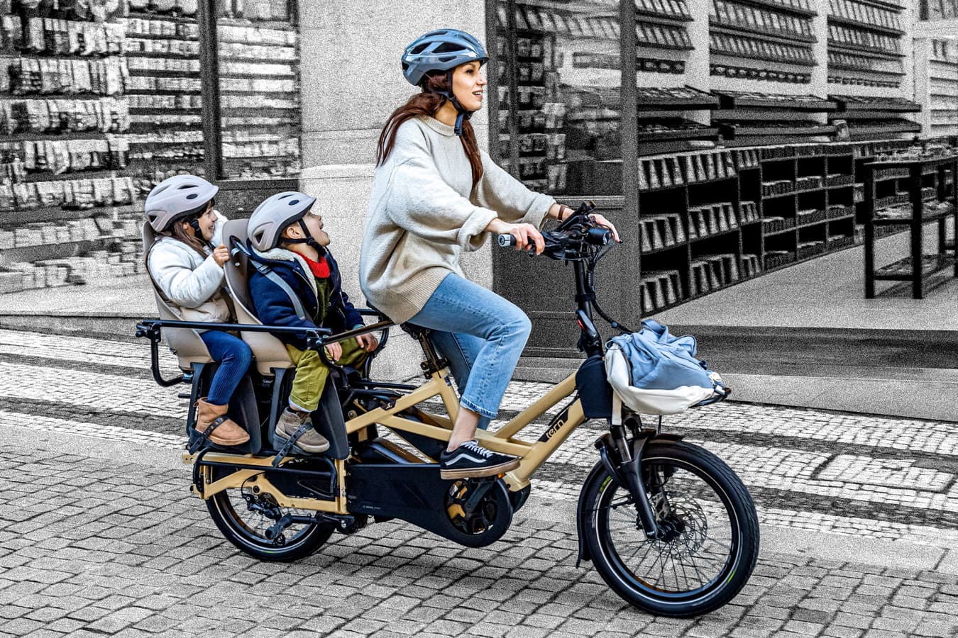 Family riding a cargo electric bike with BikeInsure bicycle insurance coverage (Electric Bike Insure)
