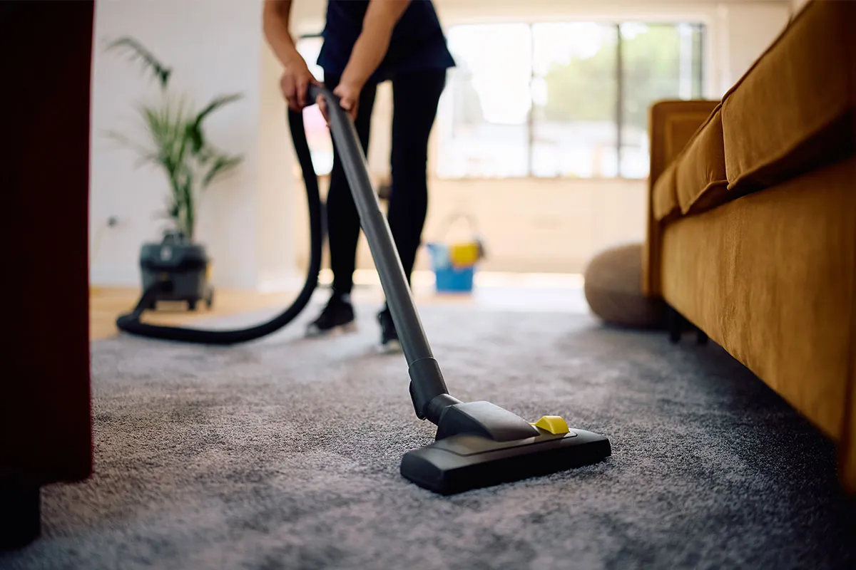 Residential carpet cleaning Fort Myers technician deep cleaning carpet fibers with good products for a clean home and better indoor air quality.