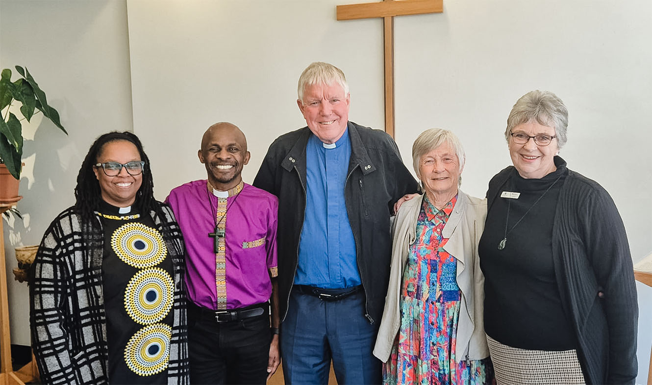 Stephen Gully (centre) at his decommissioning service. From the left: Rev Watiri Maina, Bishop Steve Maina, Rev Stephen Gully, Lesley Gully, hospital chaplain Marion Rowe.