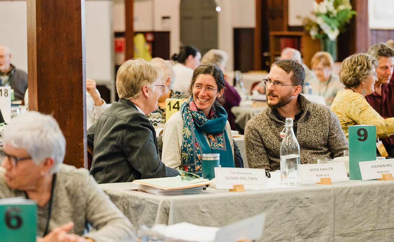 People laughing and discussing at Nelson Anglican Synod 2025