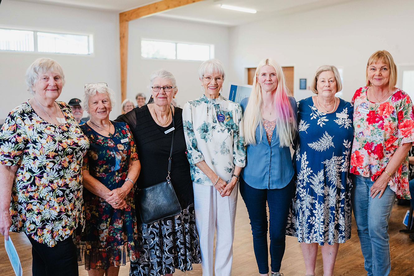 Rest home chaplains line up for a photo