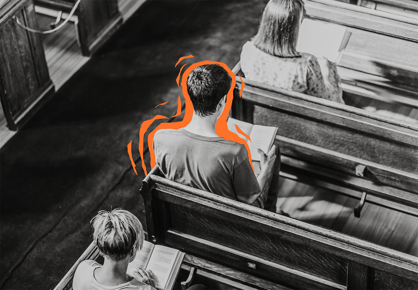 in black and white, a view from above, people reading Bibles in the pews of a church, while one young man radiates colourful patterns
