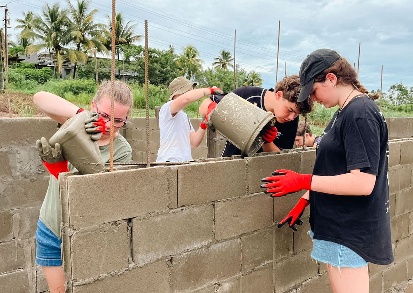 Helping build a concrete house with Mobile Mission Maintenance Fiji