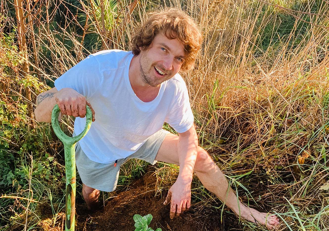 Mo planting a sapling