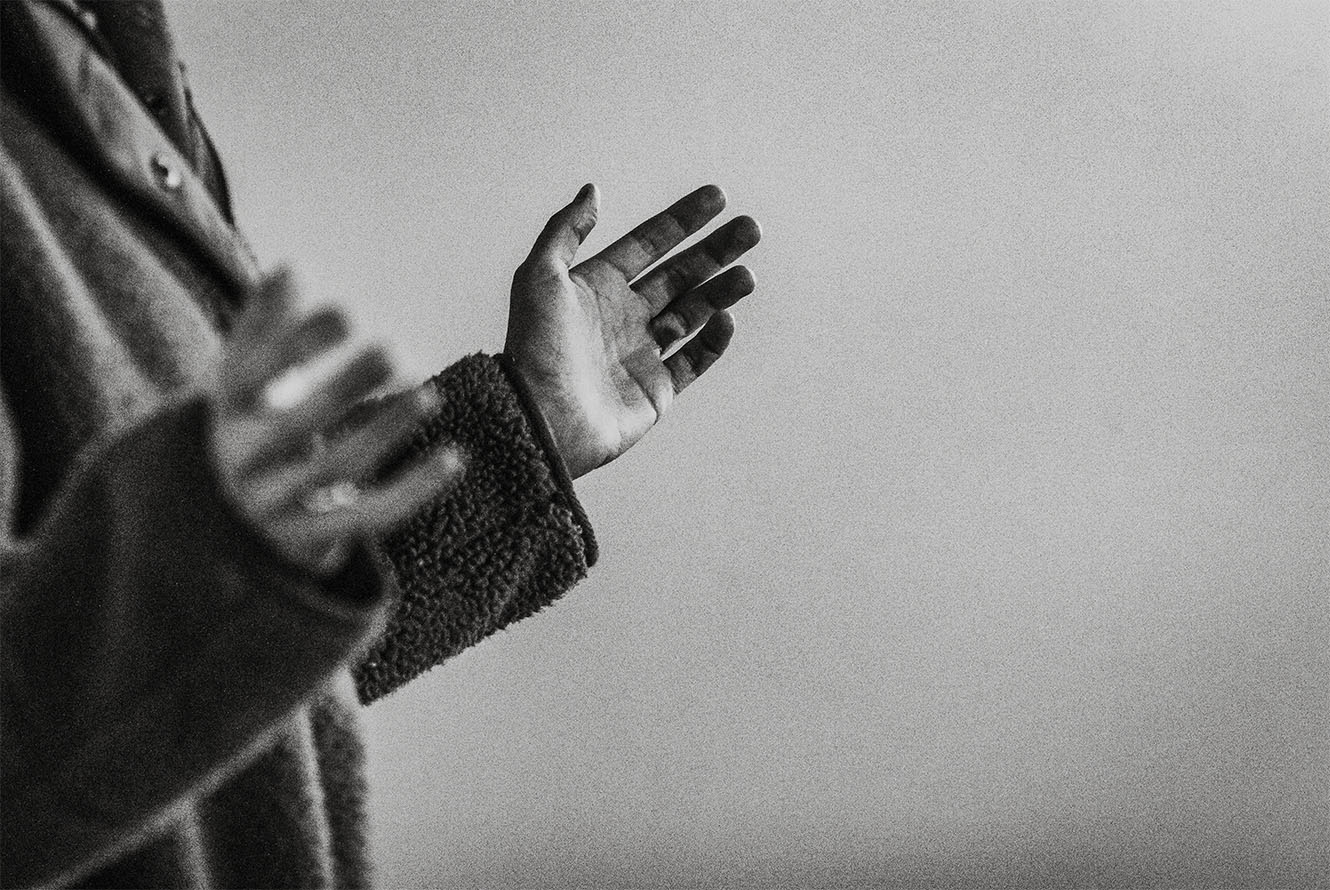 hands lifted in worship and prayer