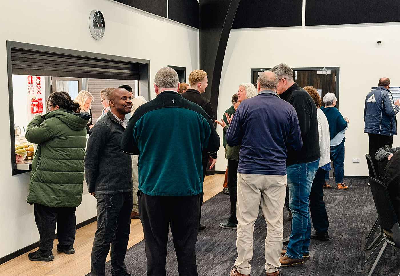 people in deep discussion at Nativity Church