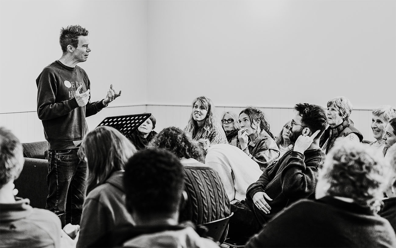 Mission coach Nathan Hughes runs a workshop to a crowd of people