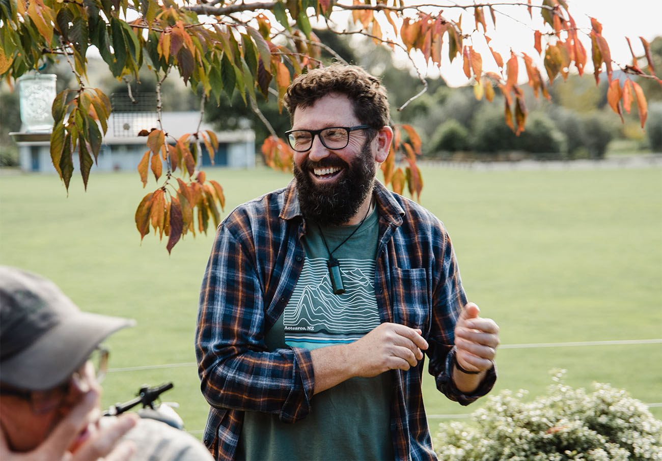 Paul Milson outside laughing with others