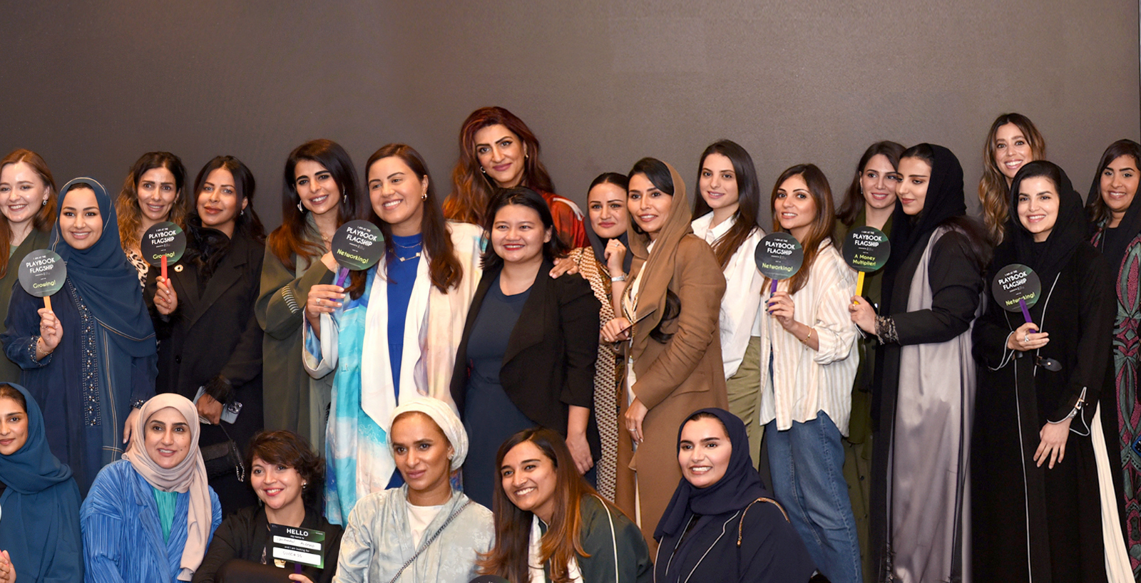 Women in conversation at a PLAYBOOK gathering in Kuwait.