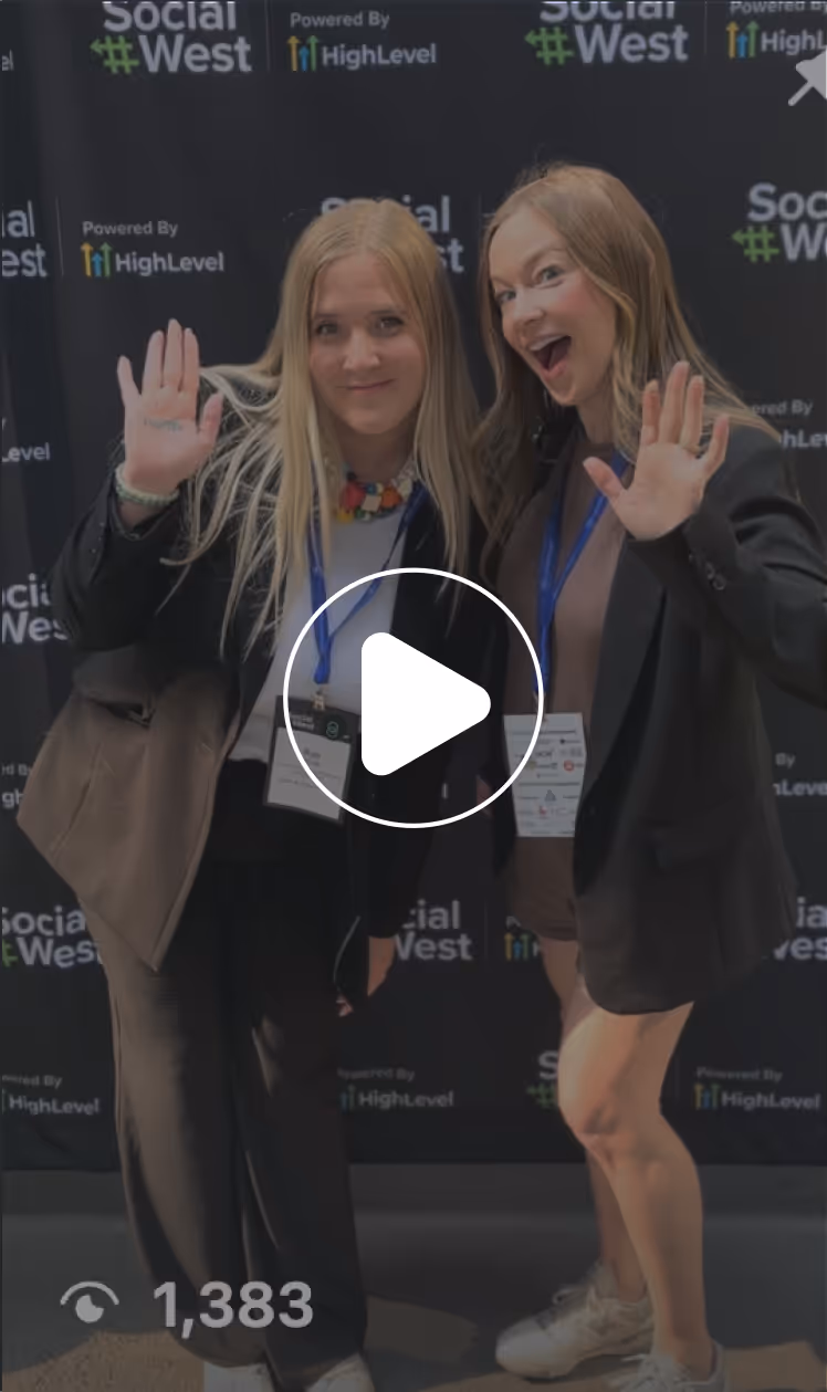 Reel of Kass & Rae smiling wearing business attire with event badges waving in front of a Social West backdrop.