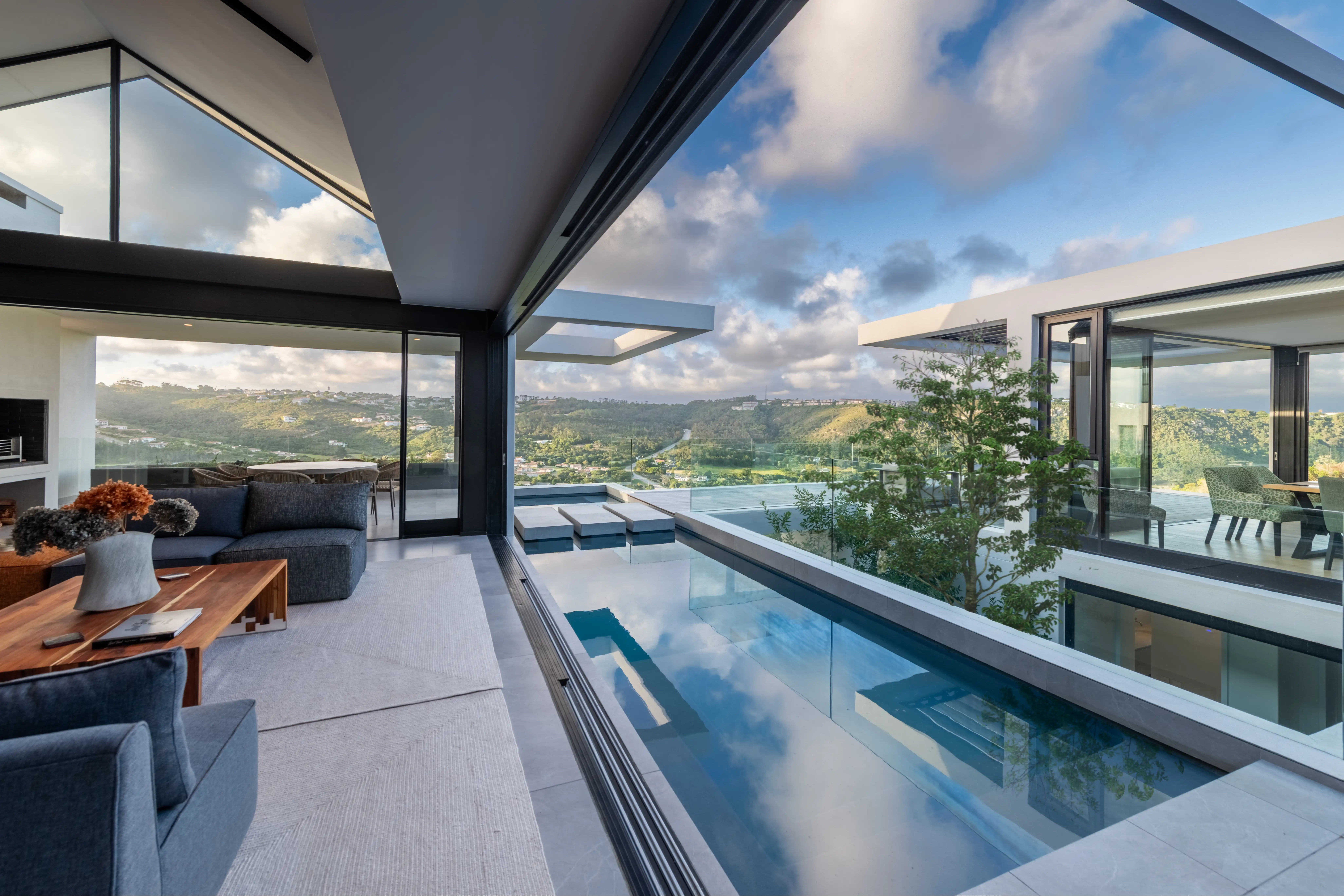 Render of a house surrounded by bushes