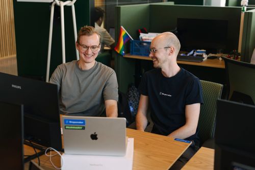 Two people sitting i couch