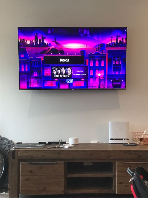 TV installed on the wall with in wall wire concealment