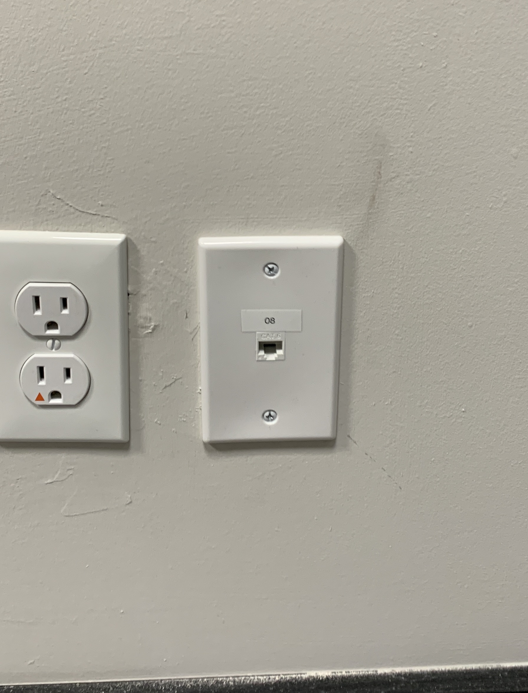 Ethernet jack installed into a plate