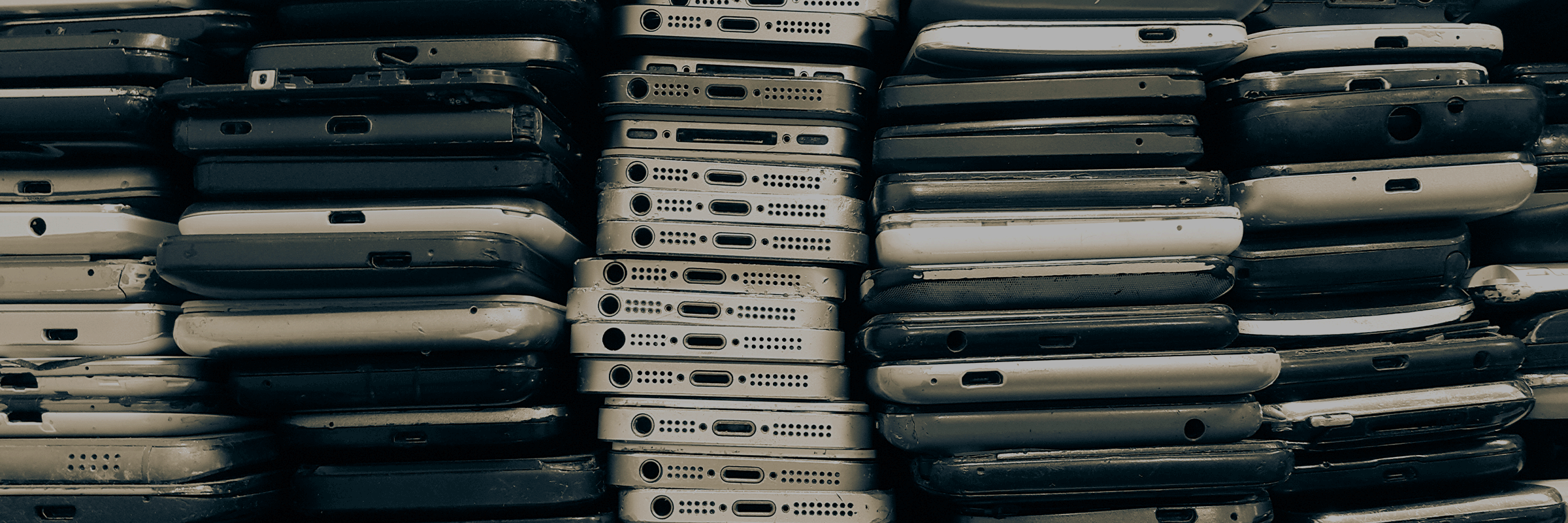 A healthcare worker reviewing information on monitor