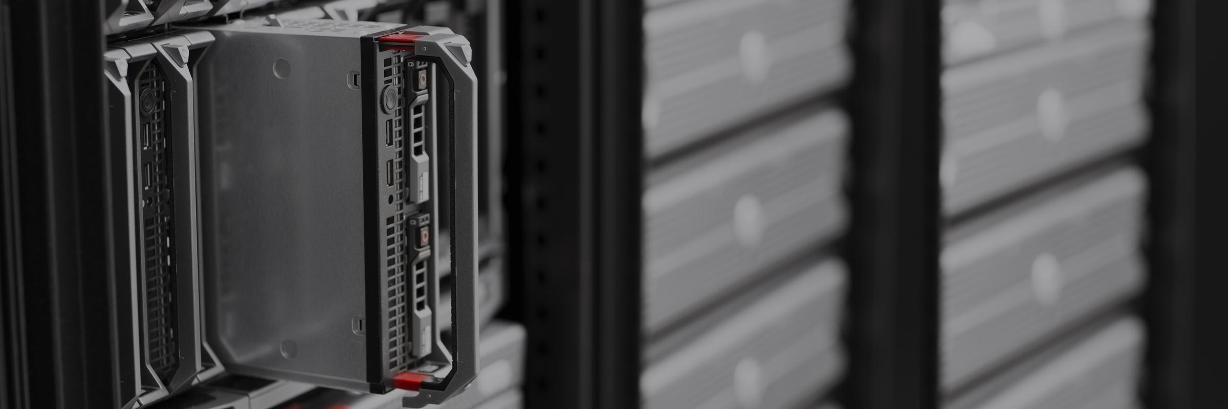 A healthcare worker reviewing information on monitor