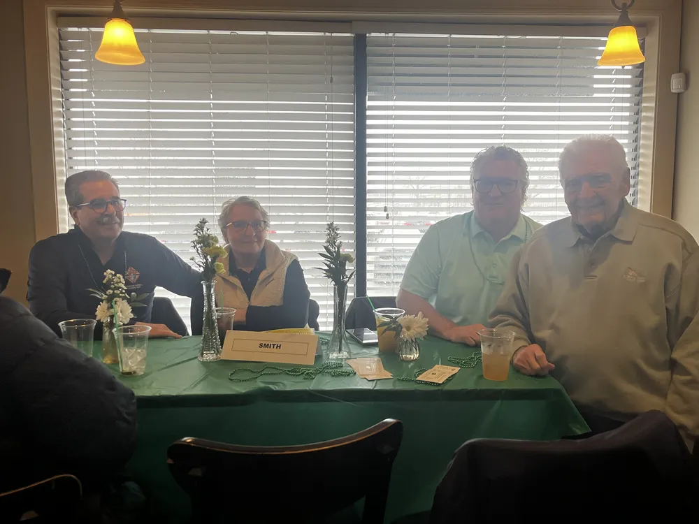 River Grove Lions Club members enjoying the St. Patrick's Day celebration at the annual club dinner