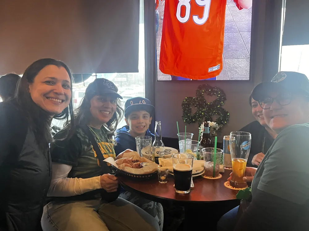 River Grove Lions Club members celebrating St. Patrick's Day together at the annual dinner and raffle event