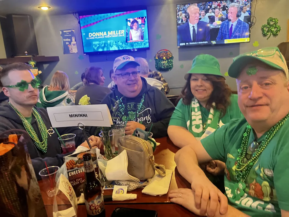 River Grove Lions Club members at a table during the St. Patrick's Day celebration and fundraiser