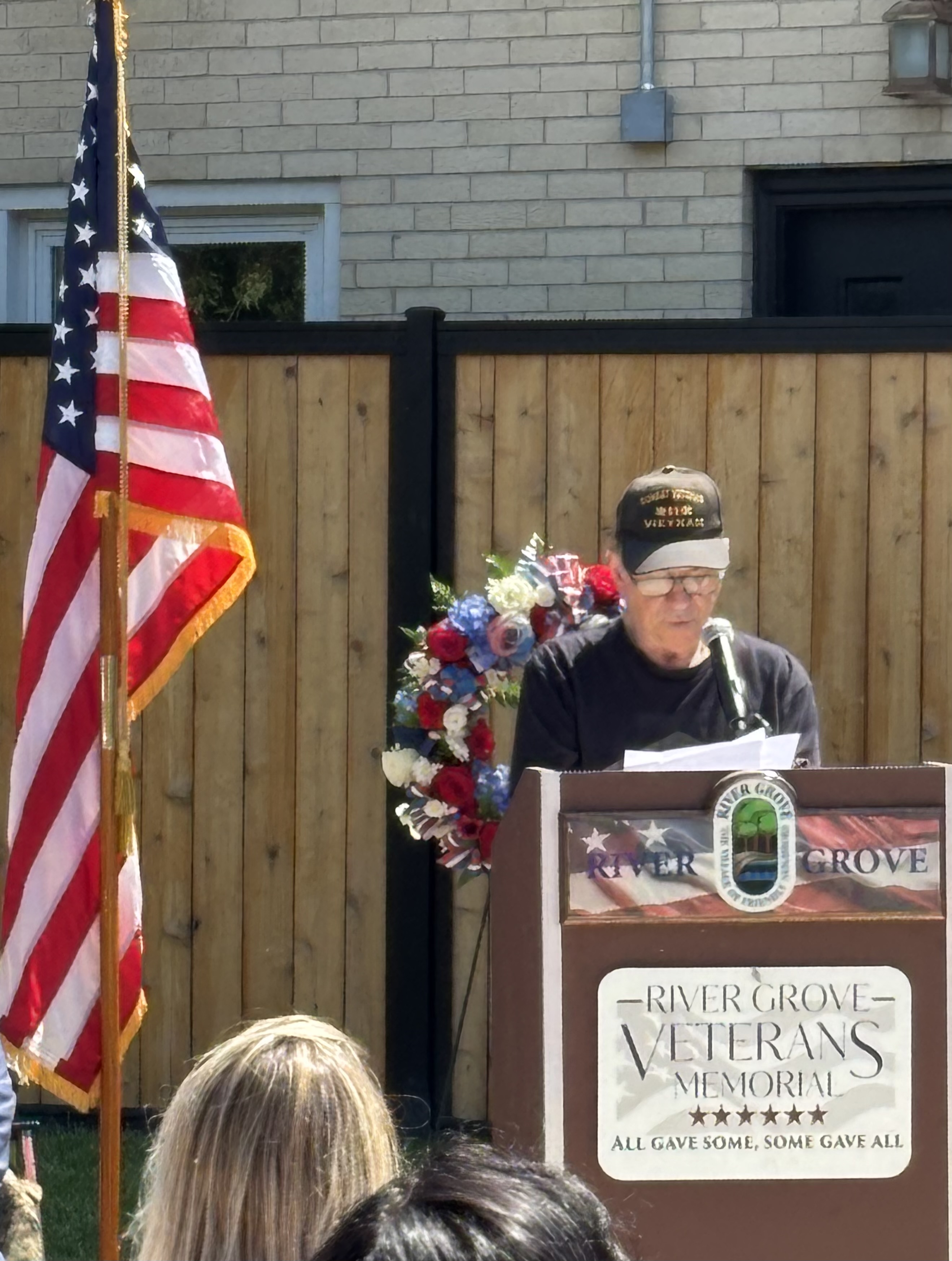 Speakers address attendees at the River Grove, IL Memorial Day ceremony in front of the Veterans Memorial on West Grand Avenue
