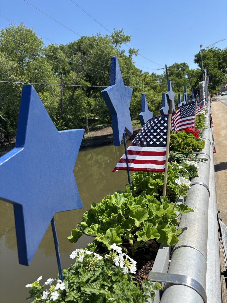 Community members and River Grove Lions Club representatives observe the 2026 Memorial Day ceremony at the Veterans Memorial
