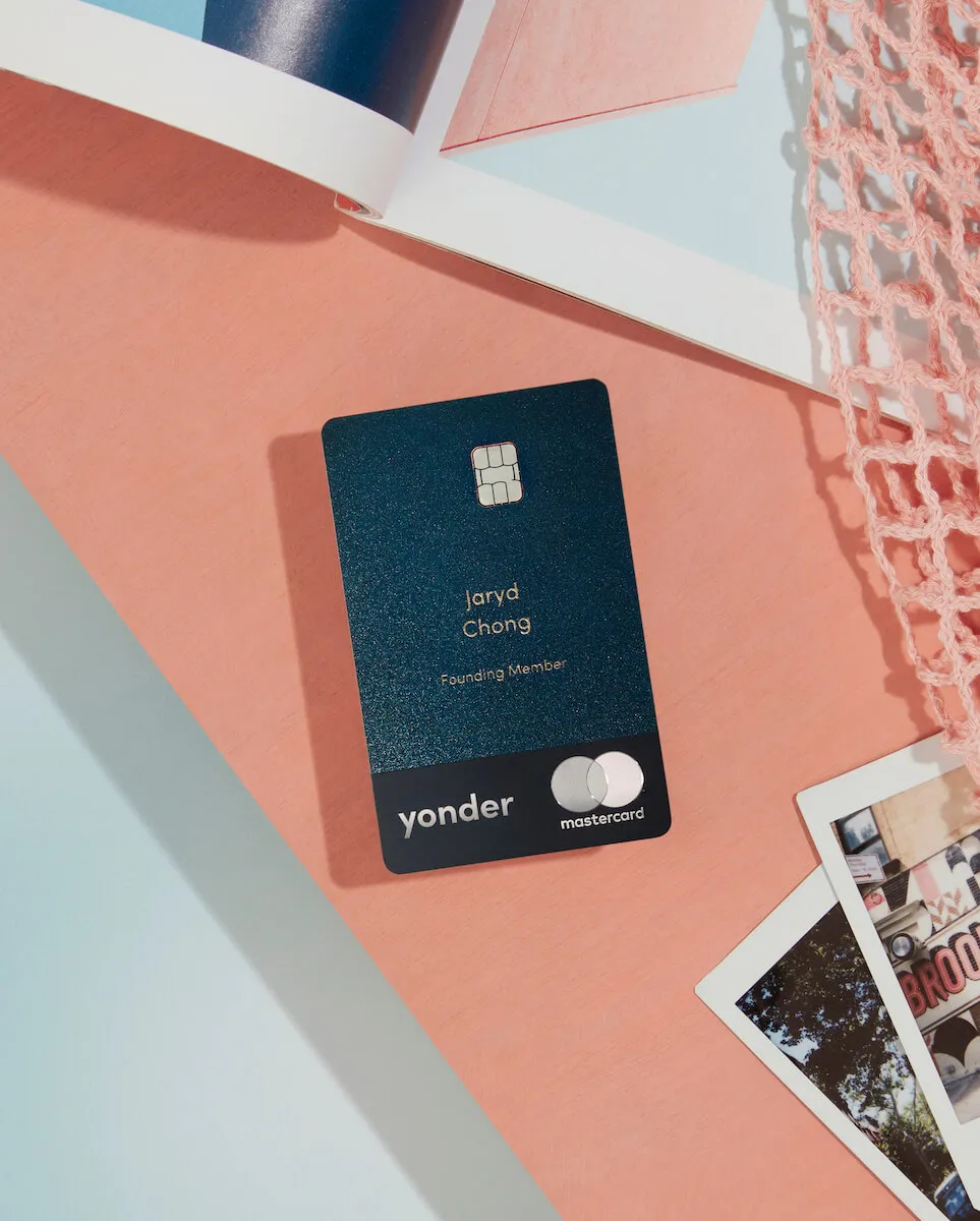 a Yonder card on a pink table top in the sun