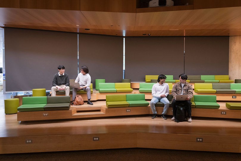 students sitting in college campus