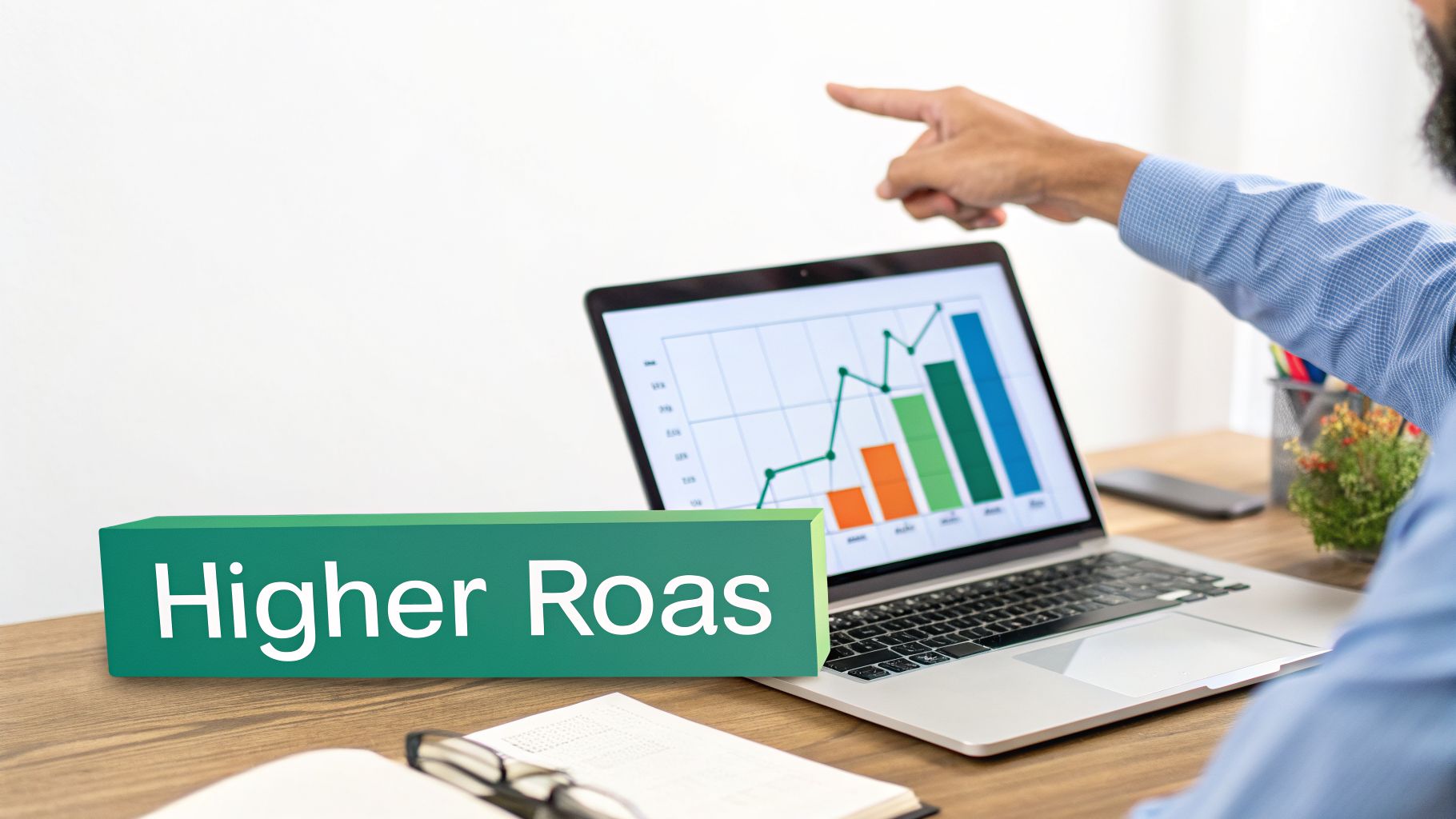 A person points at a laptop screen displaying financial graphs, with a 'Higher Roas' sign in the foreground, indicating improved performance.