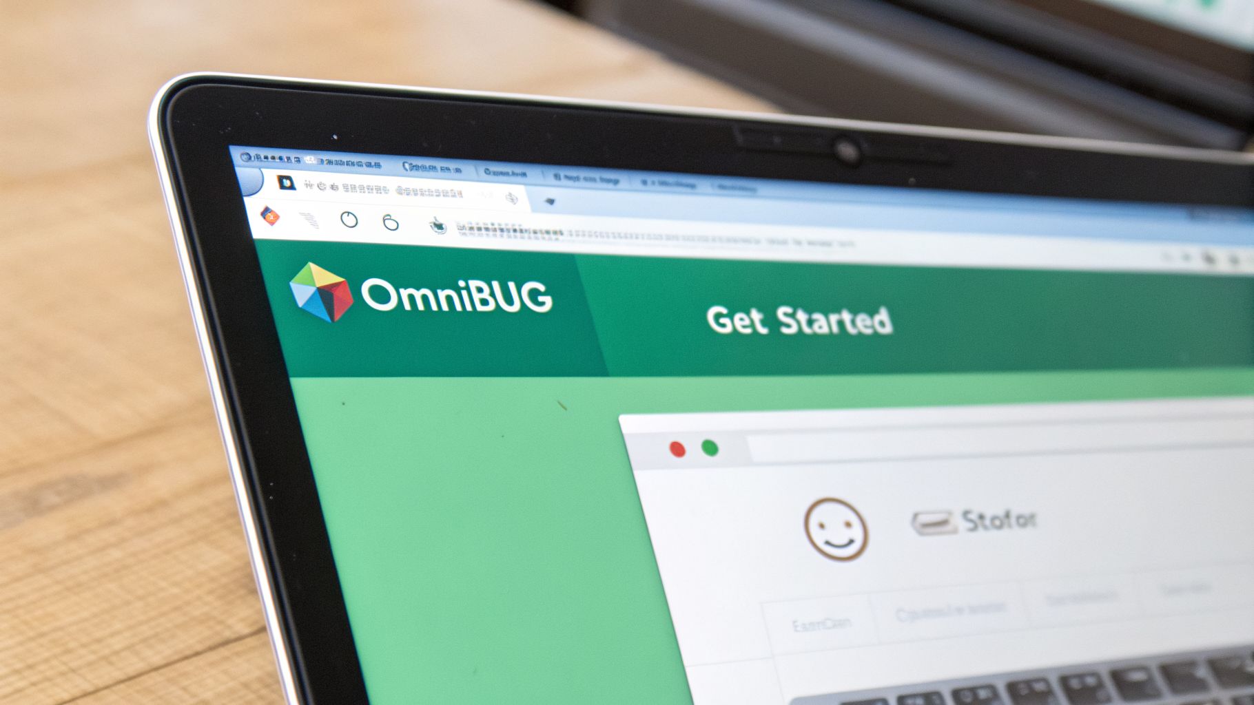 Close-up of a laptop screen showing the OmniBUG website with a 'Get Started' button.