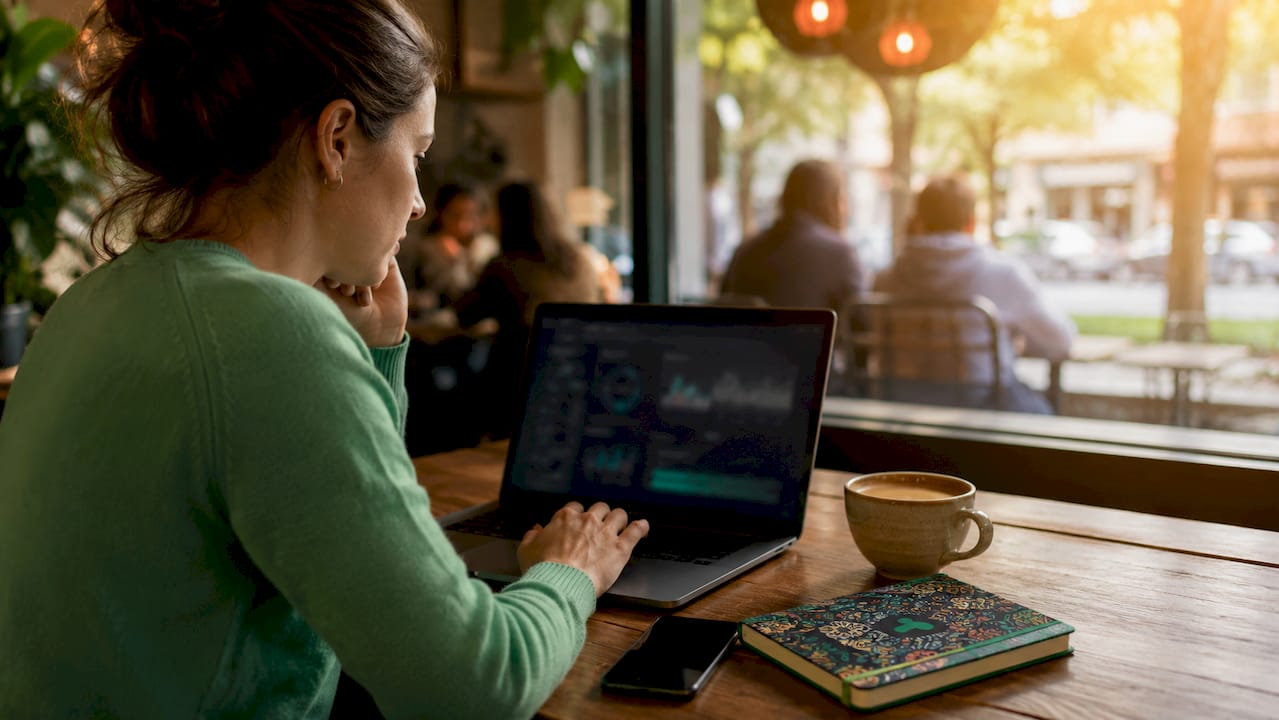 Marketing analyst adjusting audience targeting at desk