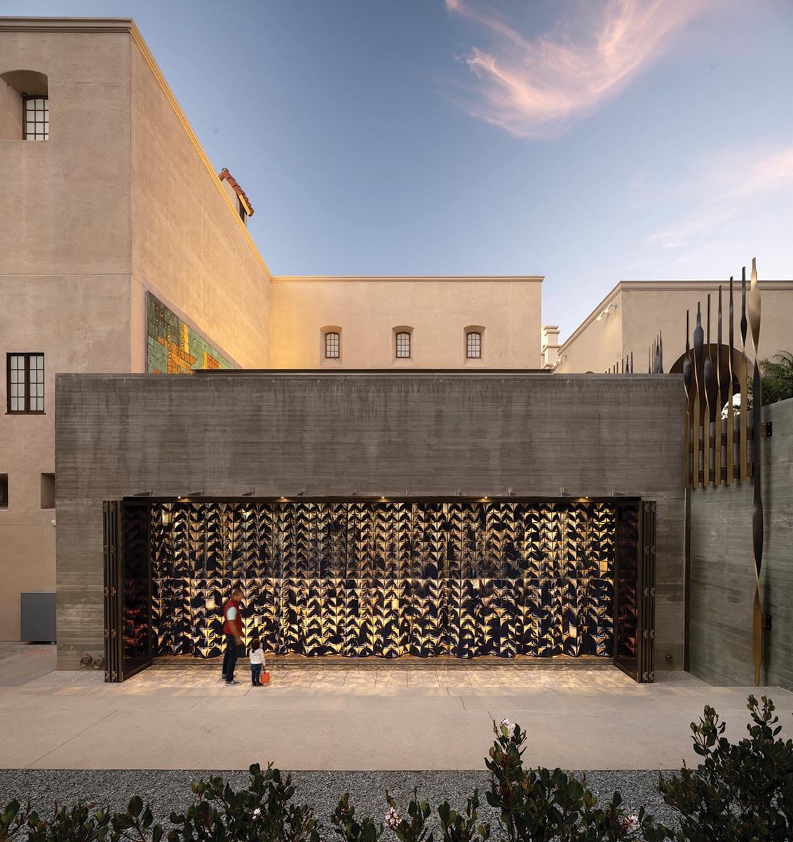 An exterior shot of the Mingei auditorium with the Sessions curtain.