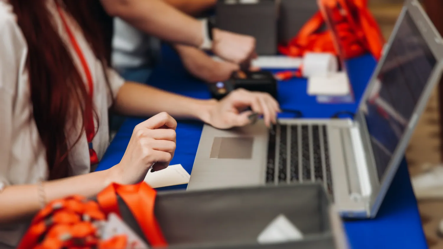 Event team reviewing an online registration page that includes secure integrated payment fields for conference tickets.