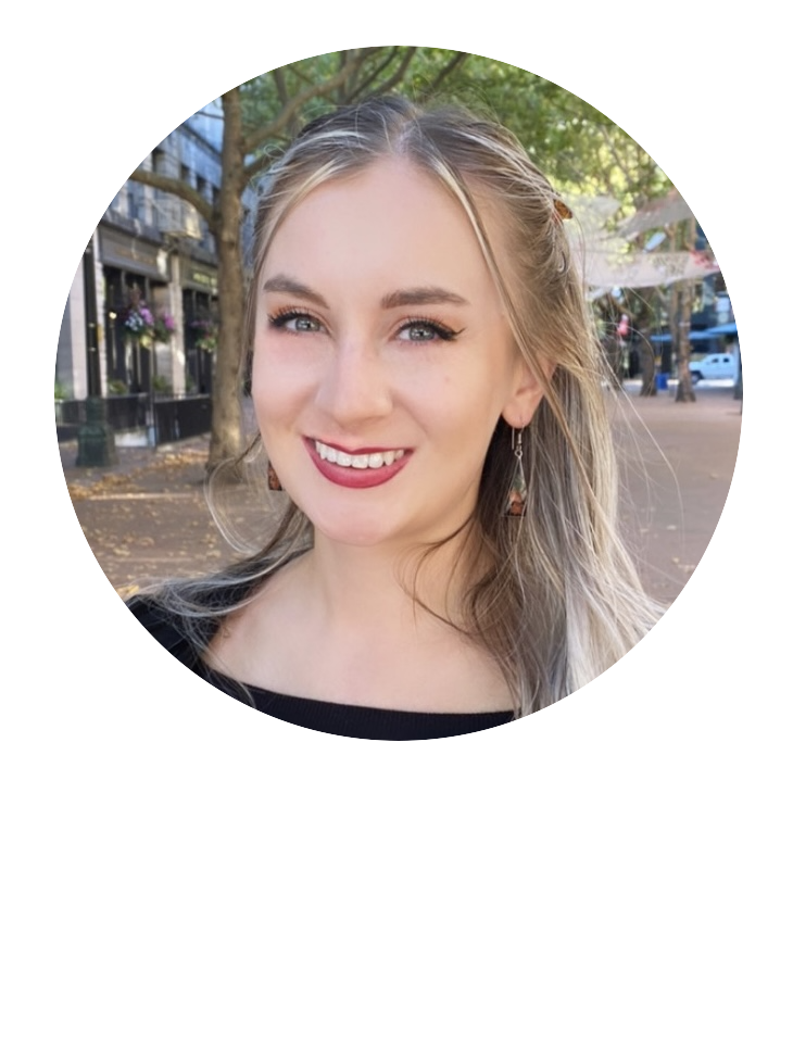 Picture of me smiling in a city square