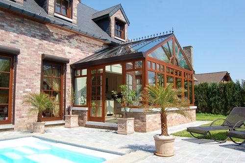 A modern dark wood conservatory