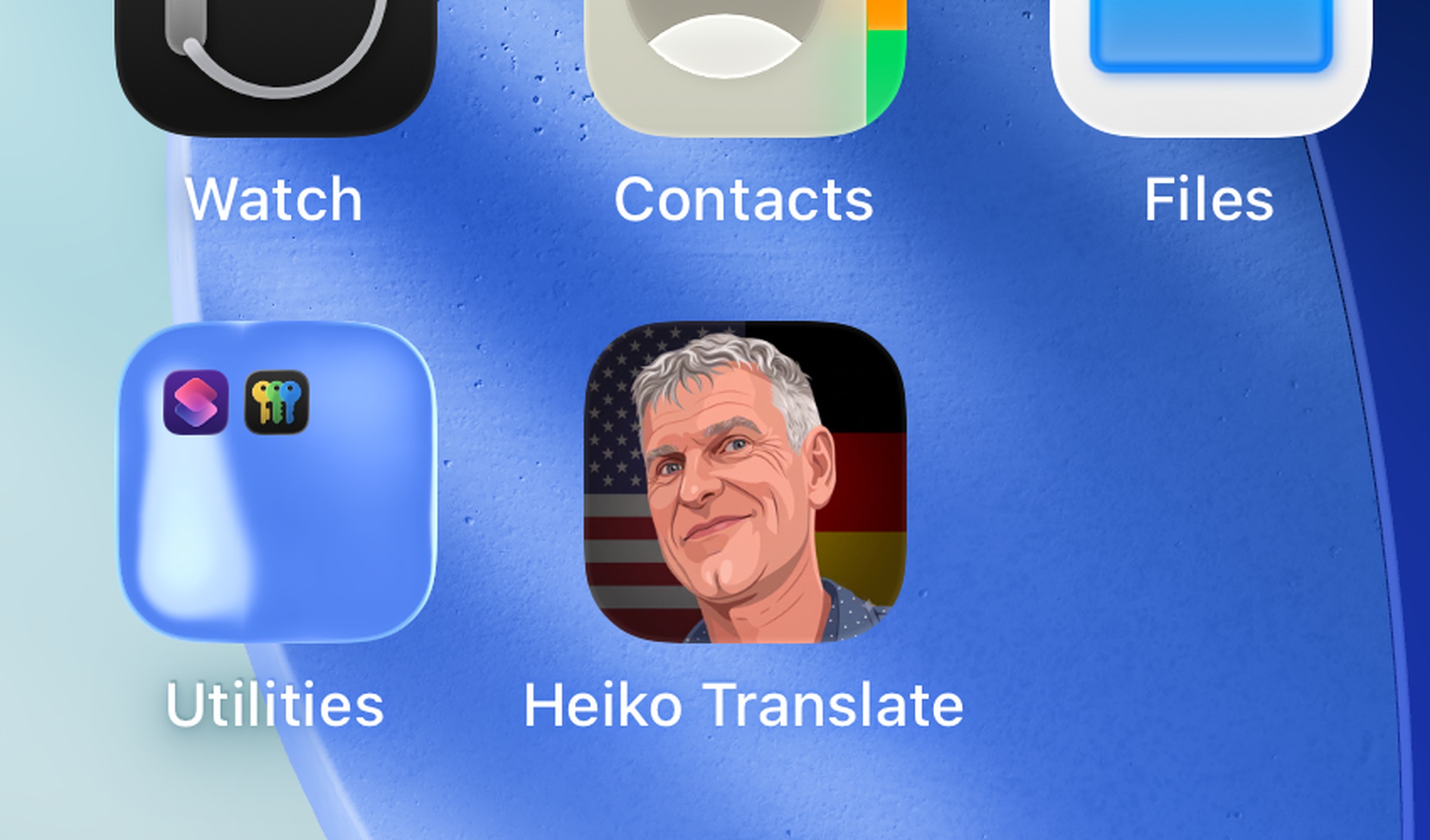 A home screen where the Heiko Translate icon is a photograph of Heiko's face