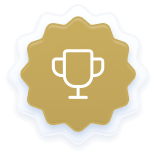 Gold badge with a white trophy icon in the center and scalloped edges.